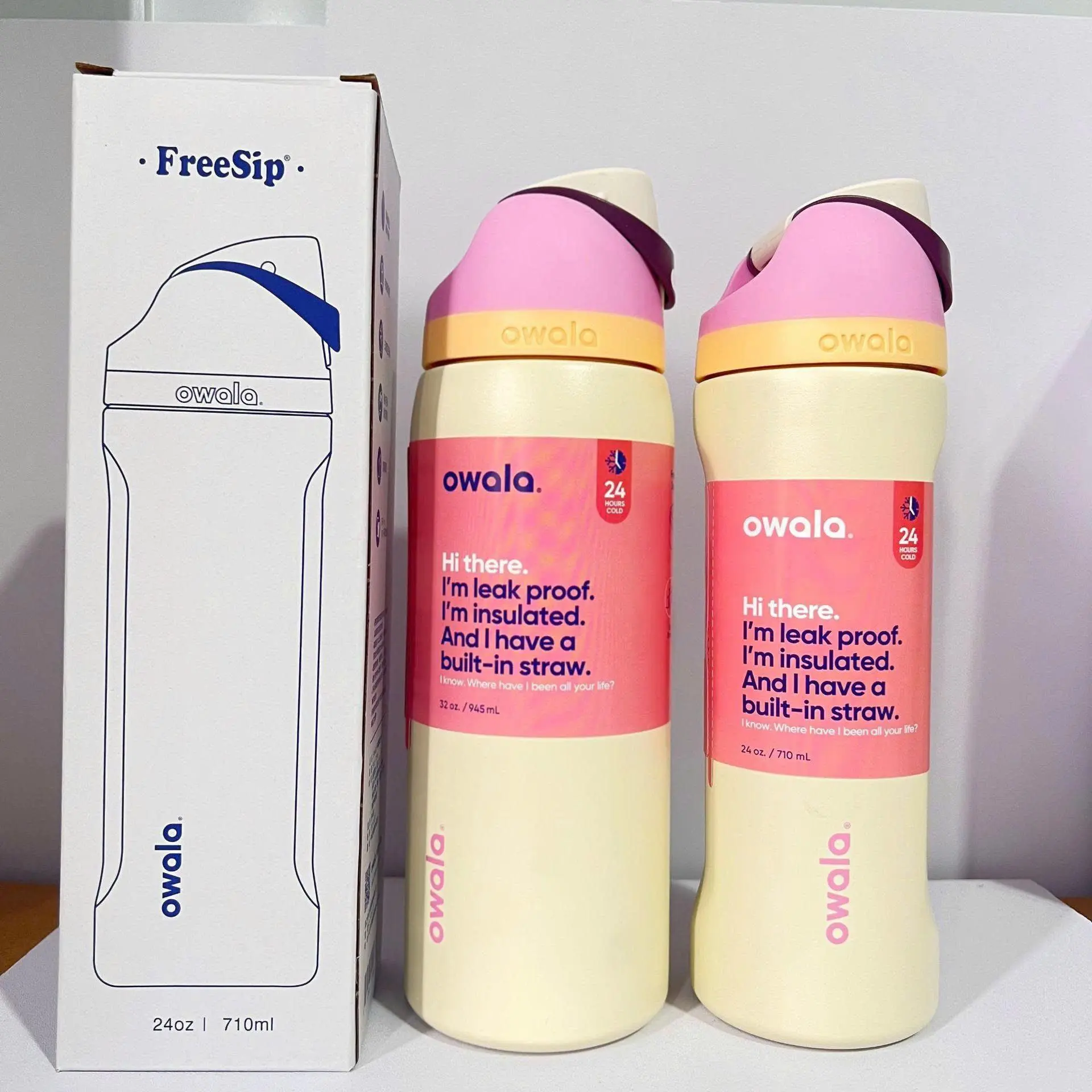 Owala FreeSip Insulated Stainless Steel Water Bottle, 24 oz, Cream Yellow & Pink, Leak-Proof Sports Flask with Patented FreeSip Spout & Straw