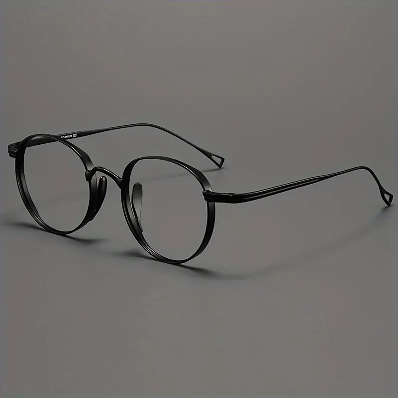 A New Style Of Retro Eyeglass Frame For Men And Women, Oval Pure Titanium Wide Frame, Unisex Eyeglasses. The Total Width Of The Glasses Is 136mm, The Width Of A Single Lens Is 49mm, The Height Of The Lens Is 45mm, The Bridge Width Is 20mm, The Temple Leng