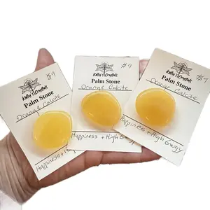 Orange Calcite Palm Stone - Natural Stone with Orange Color and Round Shape, Ideal for Home Decor