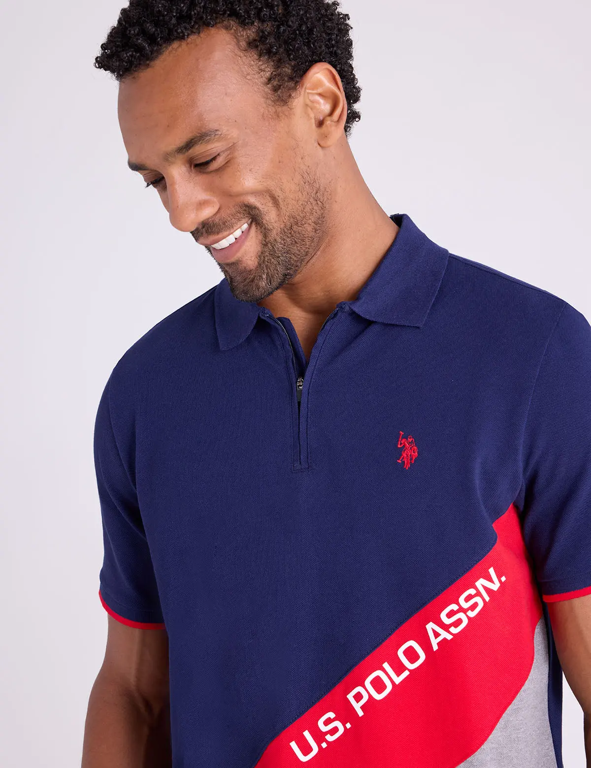 PIQUE COLOR BLOCK ZIPPER POLO SHIRT