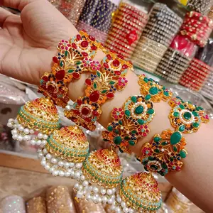 Elegant Gold-Toned Bracelet Set with Multicolor Gemstones and Pearl Accents for Festive Wear