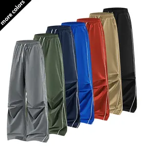 Men’s fashion casual pants with a striped design, drawstring waist, quick-drying and breathable fabric, pocket details, suitable for outdoor wear
