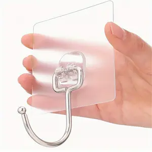 10 multi-functional heavy-duty adhesive hooks, with a maximum load capacity of 37 lbs, suitable for hanging in hotel bathrooms.