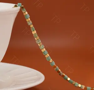 A retro, colorful and irregular fashion accessory with a sense of design, featuring a cyan block necklace