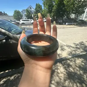 Jade with iron inclusions