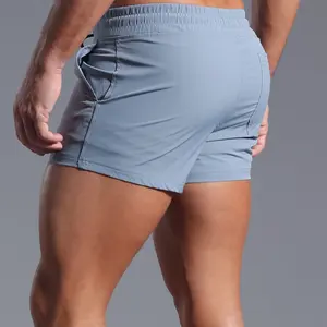 2025 Quick-Dry Sports Shorts for Men 2-Inch Shorts Ultra-Short Pants Hot Pants Muscle Fitness Running Mid-Length Shorts Beach Shorts