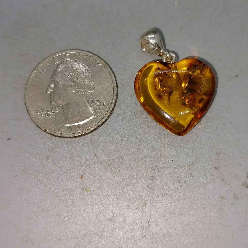 Baltic amber heart with silver bail