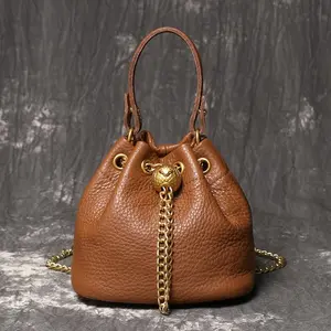Ladies' First-Layer Cowhide Bucket Bag, Genuine Leather Handbag with Golden Hardware, Detachable Shoulder Strap with Chain Decoration, Elegantly Stylish Design, Multifunctional Fashion Accessory |     Elegant Design |     Vegan Handbag