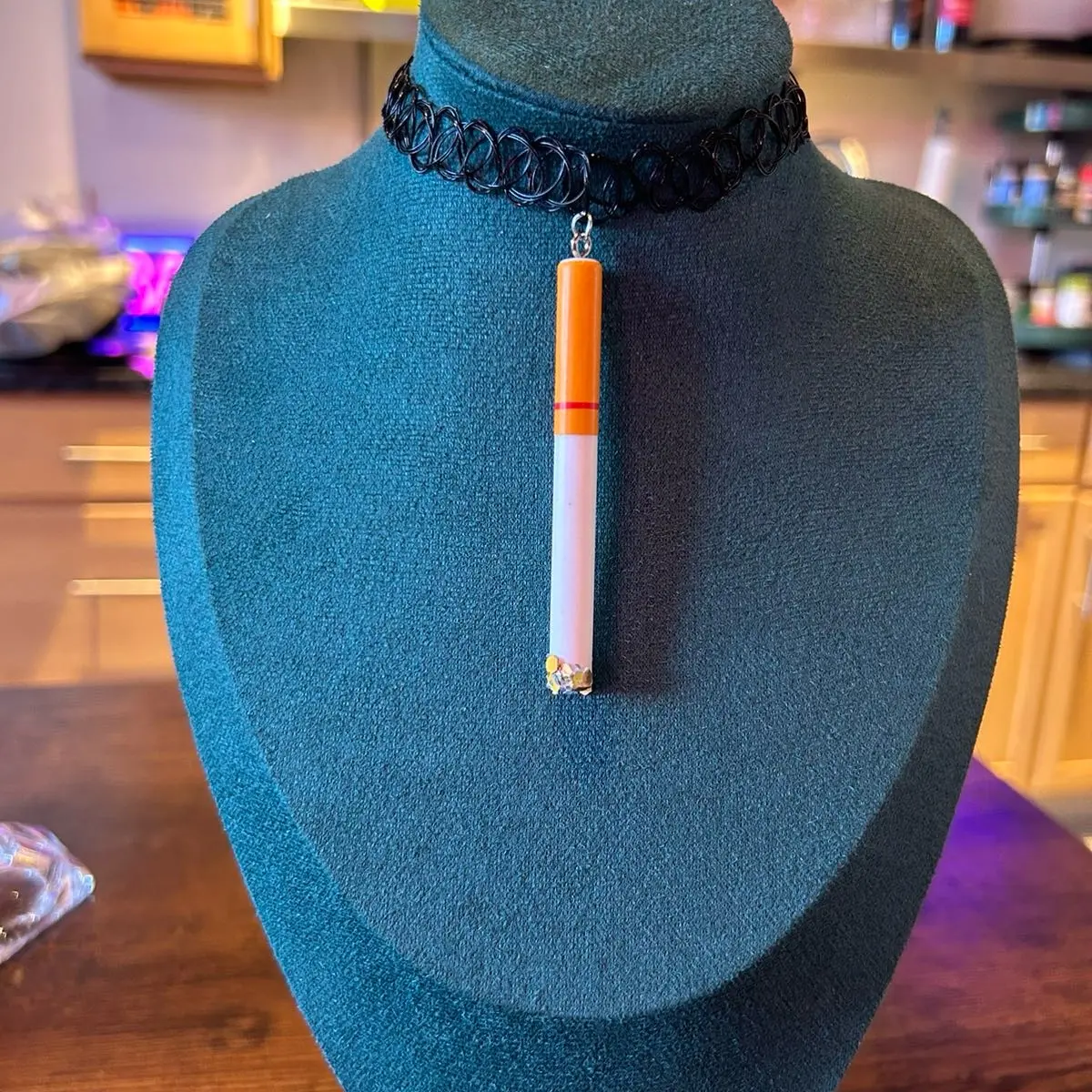Tattoo choker with cigarette pendant