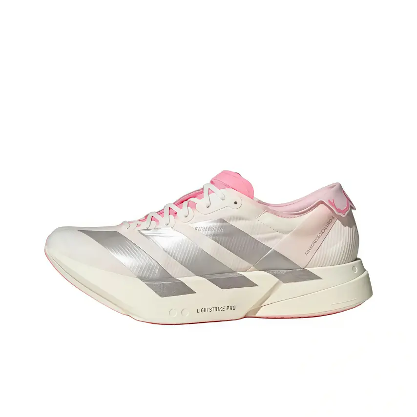 Tri-tone pastel athletic footwear balancing lightweight race performance and soft minimalist aesthetics. Warm cream base collides with metallic silver stripes and blush pink accents