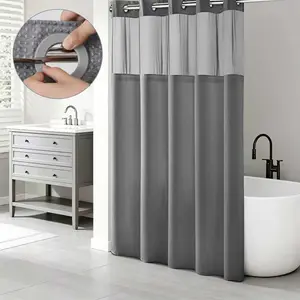 Grey waffle hookless shower curtain with snap-in waterproof liner. Double-layer washable fabric curtain with included liner, a bathroom decor suitable for hotels, beauty salons and home use with versatile size adaptability.