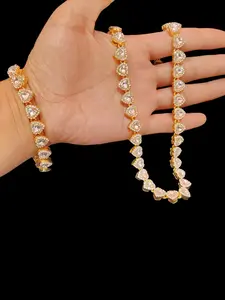 Full-Diamond Heart Tennis Chain Set | Silver/Gold Necklace and Bracelet, Ultimate Glitter Alert. This full-diamond heart tennis chain necklace and bracelet set features sparkling crystals, available in silver/gold colors. It instantly evokes a red-carpet