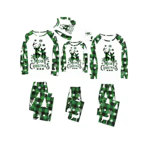 Green and white family matching Christmas pajamas featuring a deer, letter, and snowflake pattern—long-sleeve tops and plaid pants sleepwear set