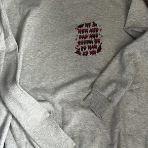 A little woozy horror crew or tee