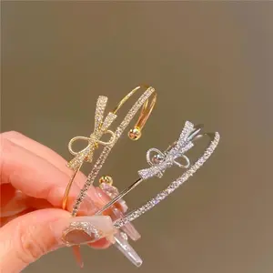 Elegant Gold Bow Bracelet with Synthetic Cubic Zirconia Inlay, Women's Open Design Bracelet for Casual and Special Occasions