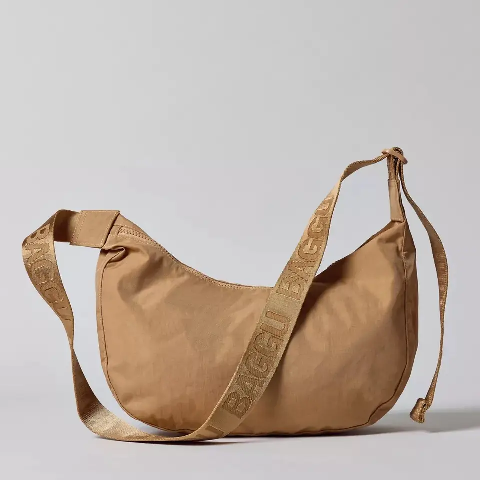 BAGGU Medium Nylon Crescent Bag - Half Moon Bag with Adjustable Strap & Interior Pockets - Recycled Materials for Durability - Casual Shoulder & Crossbody Purse