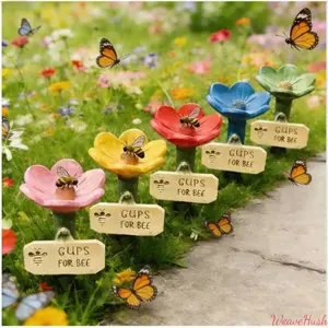 Low-profile Ceramic Bee Watering Station, durable feeder for pollinating insects. Adorable bee-shaped design, eco-friendly and practical. Ideal garden accessory for backyard and patio, it supplies water for bees while serving as a lovely outdoor decoratio