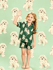 2-Piece Kids Set with Green Base Full-Body Puppy Pattern Print Short Sleeve Shorts Soft and Comfortable Skin-Friendly Smooth Flap Design Button Closure Elastic Waistband Suitable for Year-Round Home Daily Casual Kids' Sleepwear Set