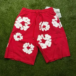 DENIM TEARS RED SHORTS
