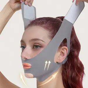 Gray V-shaped bandages, snore prevention straps, facial lift and tightening lines, facial sculpting for weight loss, breathable material, seamless design, for relaxation and sleep. Suitable for watching TV, exercising, or having fun. Relaxing sunshade