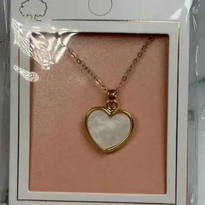 Heart Necklace with Mother of Pearl Centerpiece and Gold Tone Chain for Elegant Everyday Wear