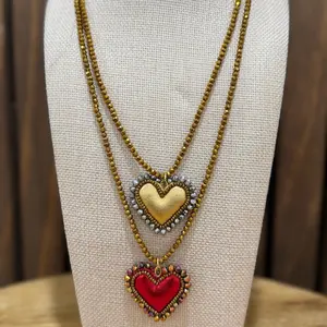 Beautiful long handmade heart necklaces.