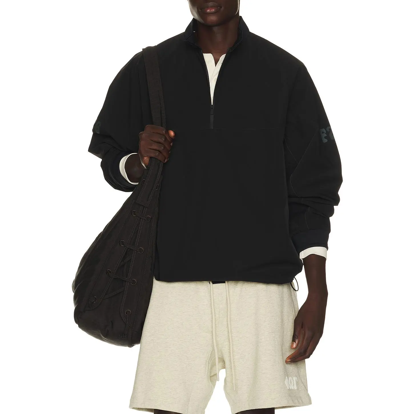 Fear of God ESSENTIALS Half Zip Track Jacket in Vintage Black
