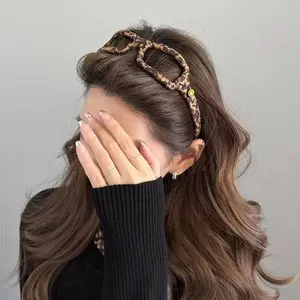 Korean-style high-end leopard print fabric-wrapped headband for women, new fashionable bangs hair clip, versatile headband