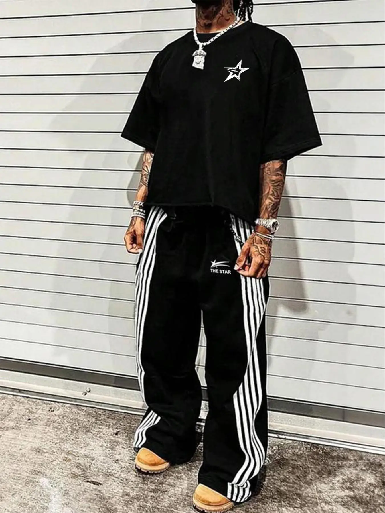 This men's two-piece Matching set includes a star-patterned T-shirt and trousers adorned with letters and stars, made from a knit fabric, suitable for casual everyday wear and year-round, Streetwear, Clothing sets