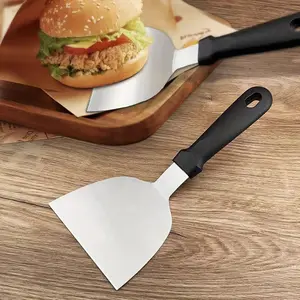 Ultra-wide heavy-duty stainless steel hamburger flipper, Utensils, with a 410-grade non-slip handle, dishwasher safe, ergonomic grip, and hanging hole. It is ideal for transferring grills, hamburgers, and cake from ovens, suitable for both indoor and o