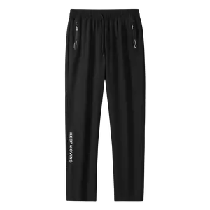 Men's casual pants with drawstring design, elastic waistband, zippered pockets, ultra thin high elastic quick dry fitness pants, skin friendly smooth fabric, suitable for indoor sports, summer outdoor activities, breathable athletic bottoms.