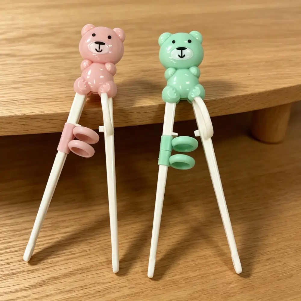 Cute Bear Kids Training Chopsticks - 4-Stage Learning Helper with Detachable Food-Safe Silicone Finger Rings, Anti-Slip Montessori Cutlery Tableware for Ages 2+ Beginner Toddlers, Pink & Green 2-Color Set