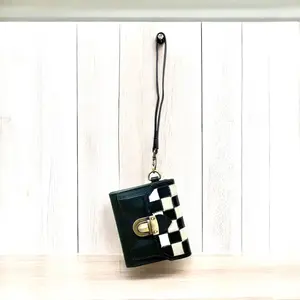 Checker tooled leather wristlet wallet 