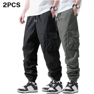 Men’s black cargo jogger pants (2 pack), street style, featuring a multi pocket design, jogger fit, and an adjustable drawstring; suitable for men’s everyday outings or commuting; casual pants with a gathered elastic waistband. comfortable