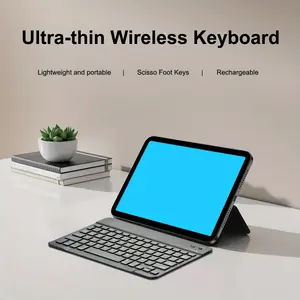 Portable wireless keyboard and mouse, compatible with iPads, smartphones, and computers. This wireless keyboard and mouse set includes a rechargeable keyboard for silent operation and comes with a USB-connected mouse pad. adjustable