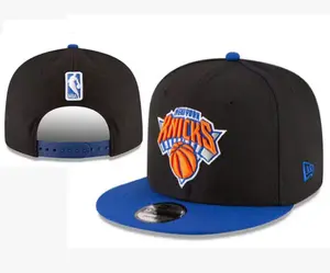New York Knicks 2T NBA TEAM-BASIC Royal-Orange SNAPBACK Hat by New Era Unisex Streetwear Hats Collector Style Headwear for Baseball and Urban Fashion Lovers
