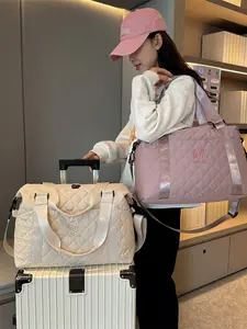 Leisure style large capacity textured diamond grid luggage bag, quilted grid pattern design, contrasting edging embellishment, multiple back methods, suitable for short distance travel and sports travel scenes, Travel Essentials Bag