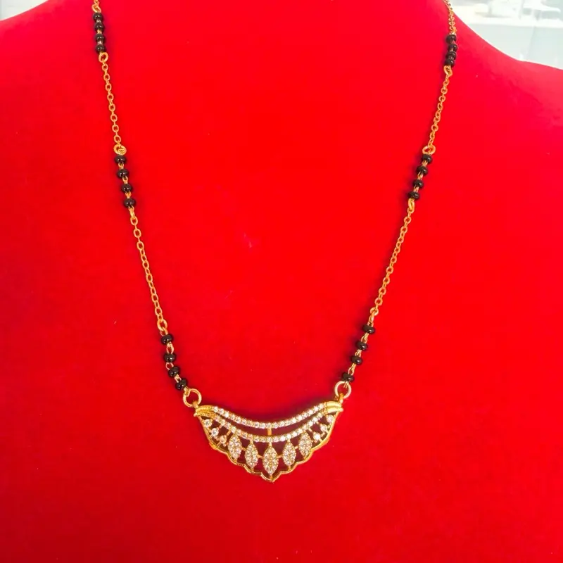 Gold plated daily use Nepali  Mangalsutra with black potey and multiple stone work on it.