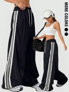 Viral Y2K Baggy Track Pants! Bold Side Stripes + Drawstring Waist, Oversized & Edgy. Perfect for Streetwear Aesthetic, Errands or Hangouts. Comfy Fabric That Slays Your OOTD. Available in Multiple Colors. #TrackPants #StreetwearFashion #TikTokFinds #Aesth