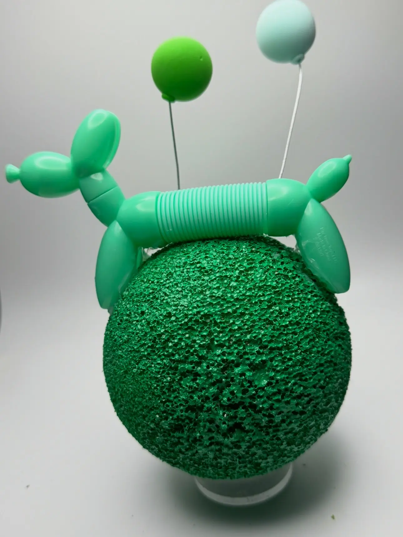 Balloon Dog w 2 balloons on 6" green sphere. Will sit on acrylic stand included.