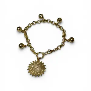 Pulcera con cascabeles y un girasol en oro laminado size 7