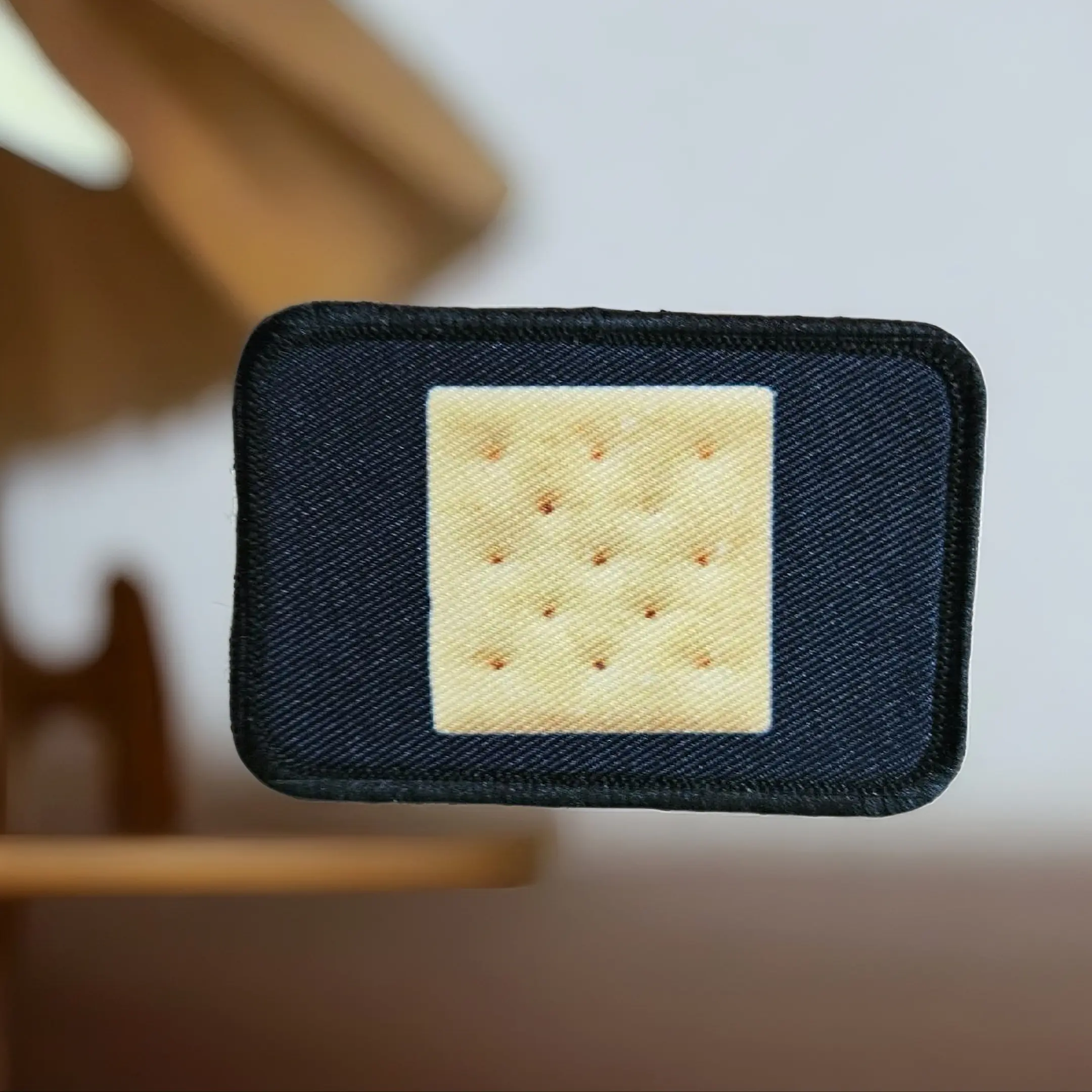 Saltine cracker enthusiast 2"x3" removable morale patch with hook and loop backing