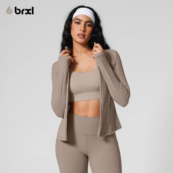 BRXL Women's Slim Fit Zippered Jacket, Sporty Long Sleeve Lightweight Stretch Top with Side Pockets for Gym & Workouts, Women's Clothes, Long Sleeve Tops, Move Without Bulk, Sporty Chic, Zip Up Front, Square Neck, Cotton, Workout Outfit Inspo, Stretch Fab