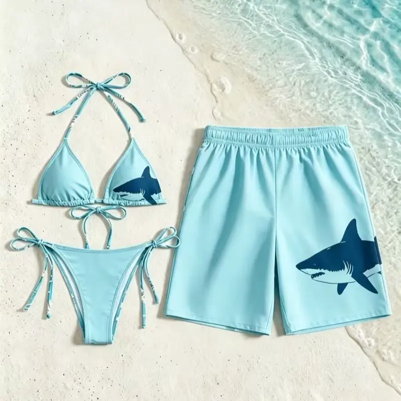 Matching Couple Shark Print Swimwear Set, Women'S Halter Tie Side Dark Blue Shark Graphic Bikini And Men'S Light Cyan Big Shark Pattern Board Shorts, 3pcs Ocean Animal Theme Beach Bathing Suit