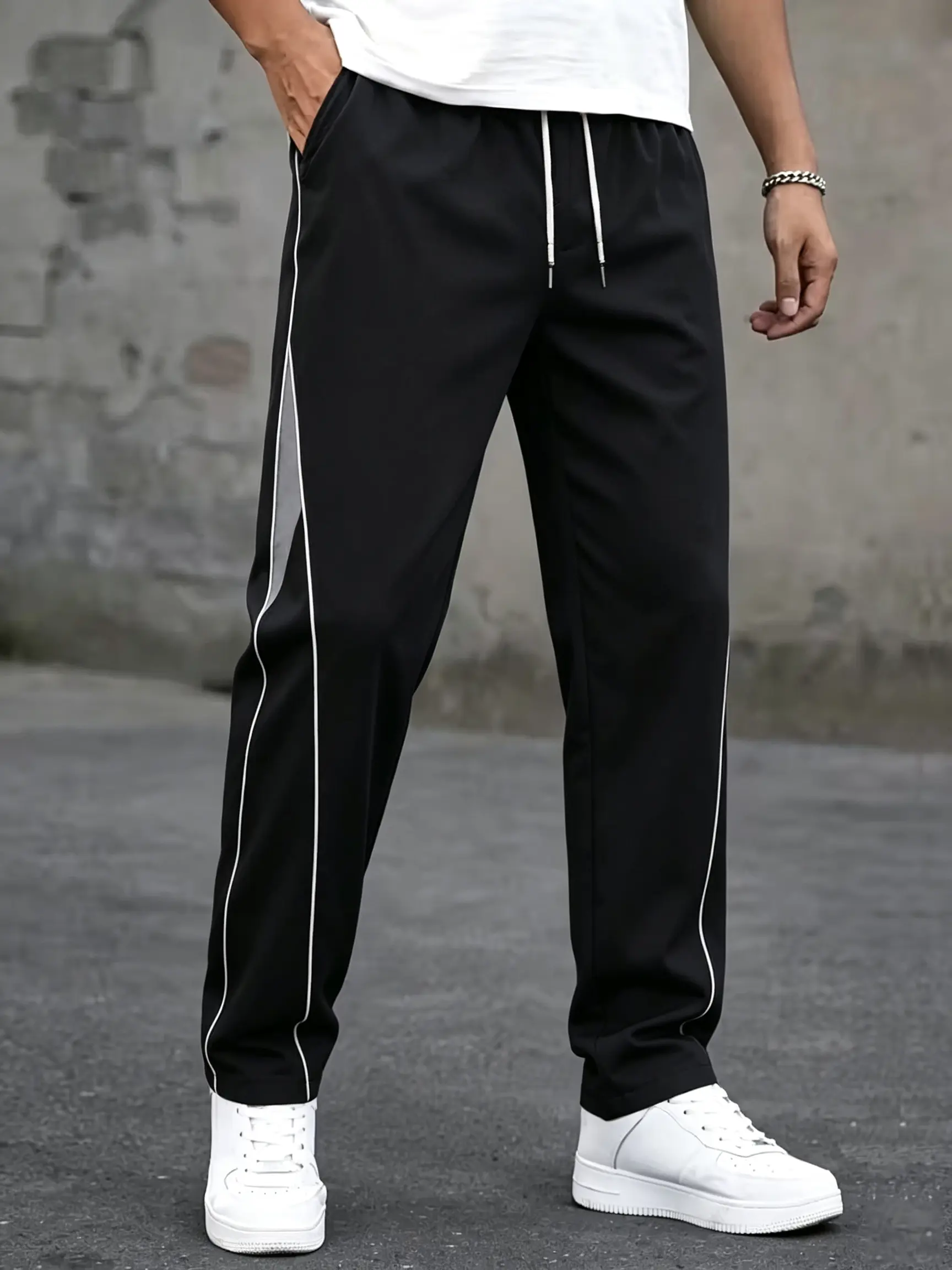 Men’s all-season fashion casual pants featuring a designer design, elastic waistband with drawstring, pockets—ideal for travel, summer outings, autumn daily commuting, fitness, sports, and running.
