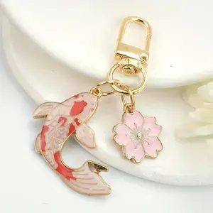 The Koi Fish Cherry Blossom Keychain Brings You Good Fortune! This Creatively Stylish Keychain Accessory Features a Lively Koi Fish, Making It a Fun Pendant Suitable for Everyone. It'S a Perfect Gift Pendant to Bless for family And Friends During Th