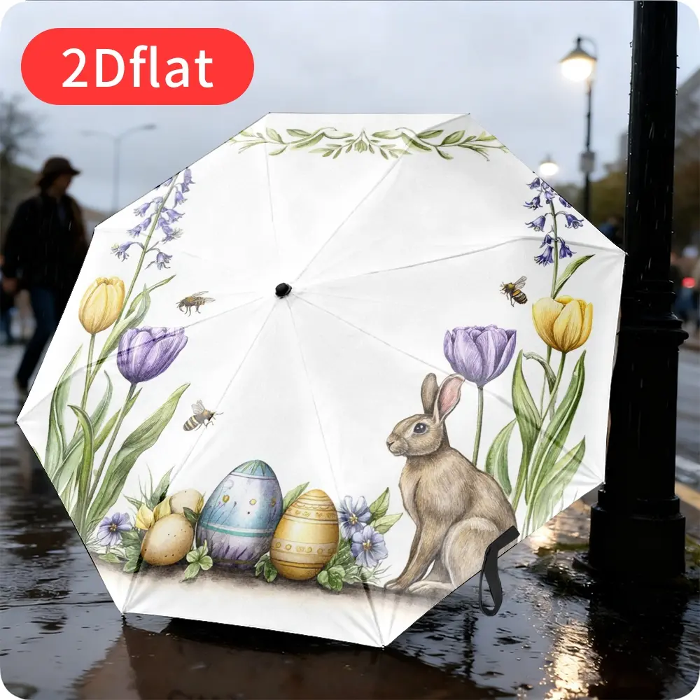 An Easter Bunny Folding Umbrella – Featuring an adorable bunny and colorful egg design with floral accents, lightweight and portable for travel and commuting, durable canopy made of sturdy plastic and metal, perfect as