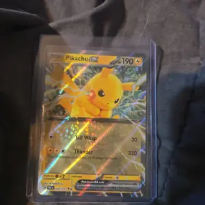 Pikachu EX 190 HP T Pokémon Trading Card Game Card with Tail Whip 30 and Thunder 220 Damage Effects