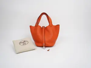 Pre-owned calfskin Tote Bags Hermes Taurillon Clemence Picotin Lock 18 PM Orange Hand Bag