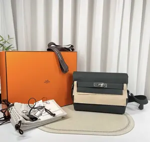 Pre-owned HERMÈS calfskin Messenger Bags Kelly Messenger PM (Gris Misty) Togo Bag 2026 full set